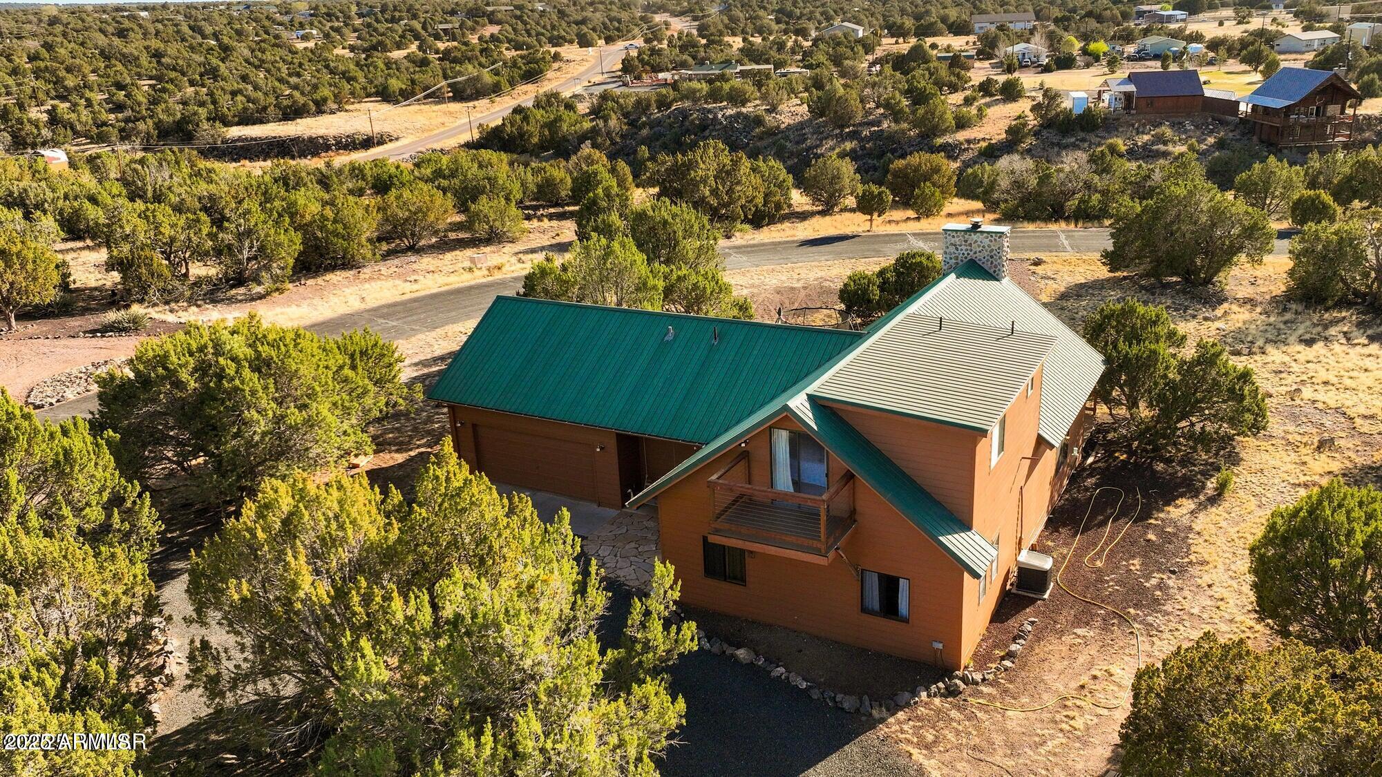 1923 Creekside Circle Show Low, AZ 85901 - Photo 15 of 71 an aerial view of a house with a yard basket ball court and outdoor seating