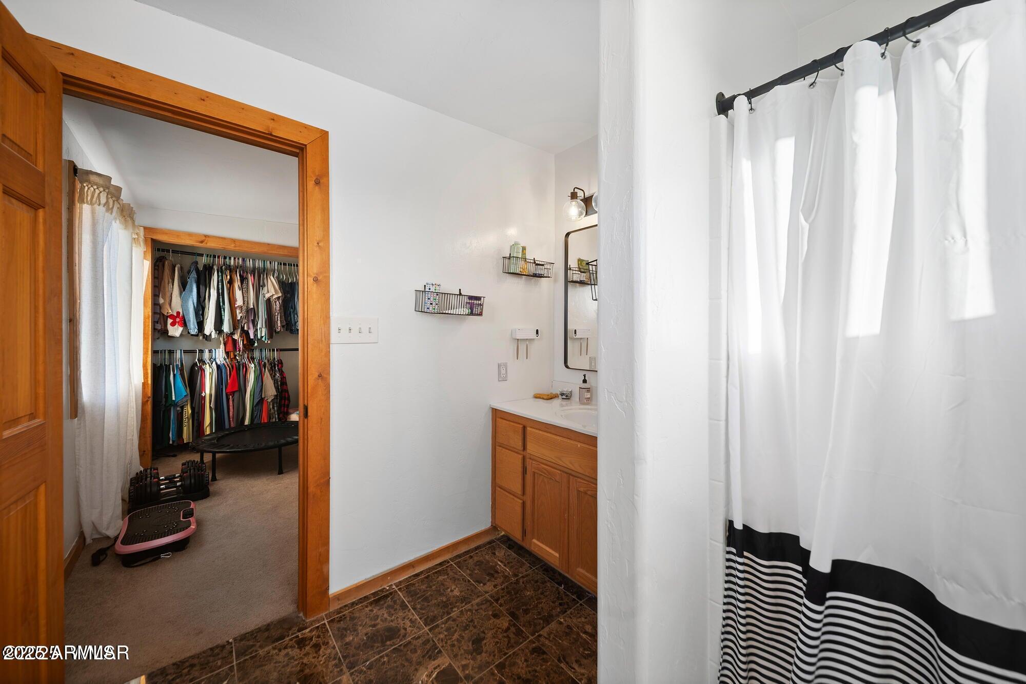 1923 Creekside Circle Show Low, AZ 85901 - Photo 51 of 71 a view of walk in closet