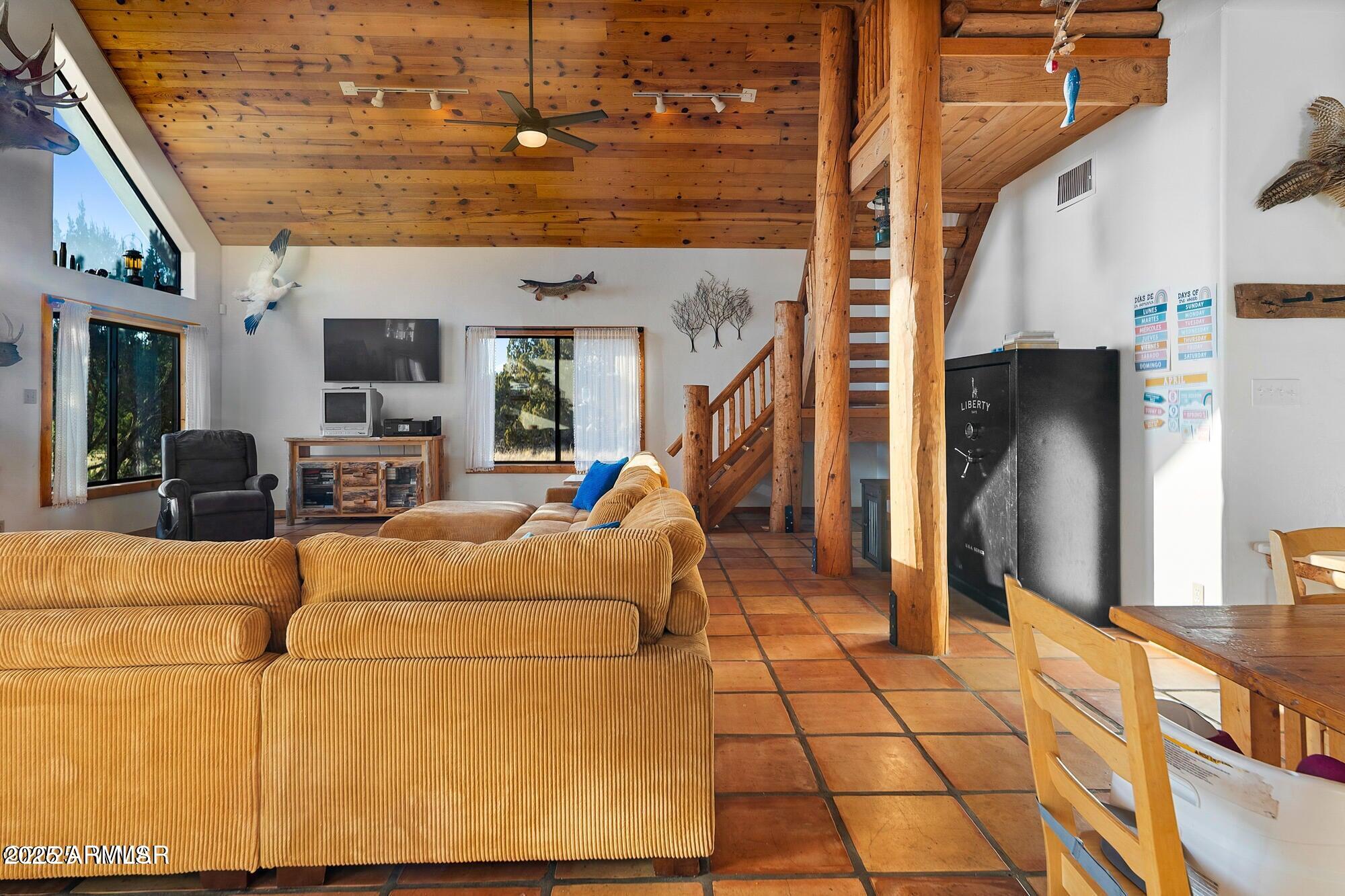 1923 Creekside Circle Show Low, AZ 85901 - Photo 63 of 71 a living room with furniture a counter top space and stainless steel appliances