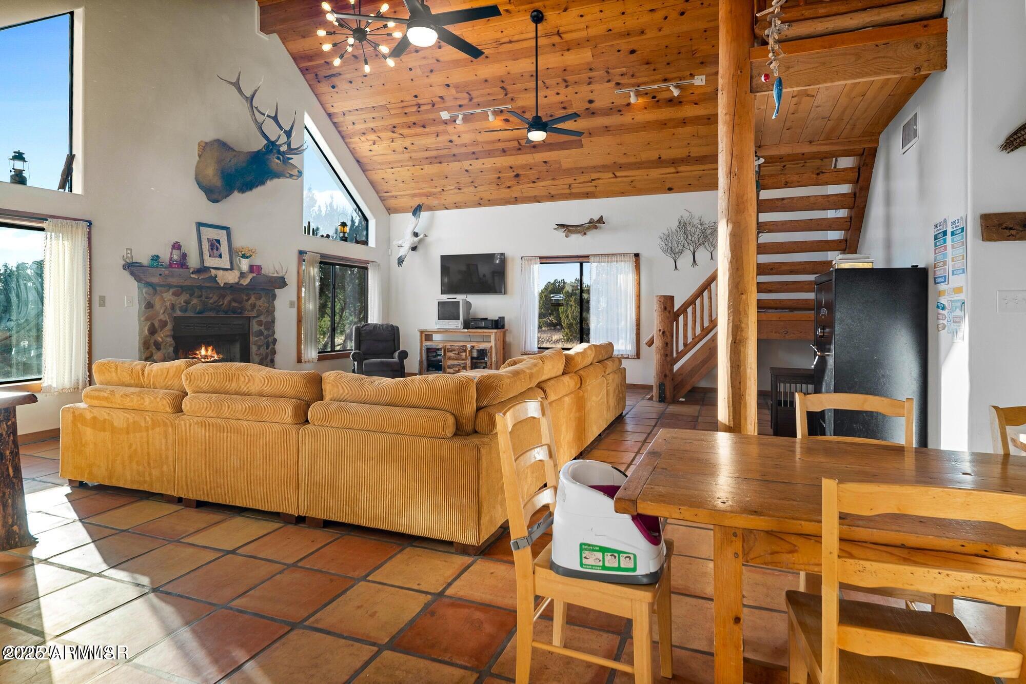 1923 Creekside Circle Show Low, AZ 85901 - Photo 64 of 71 a view of a patio with couches chairs and kitchen view