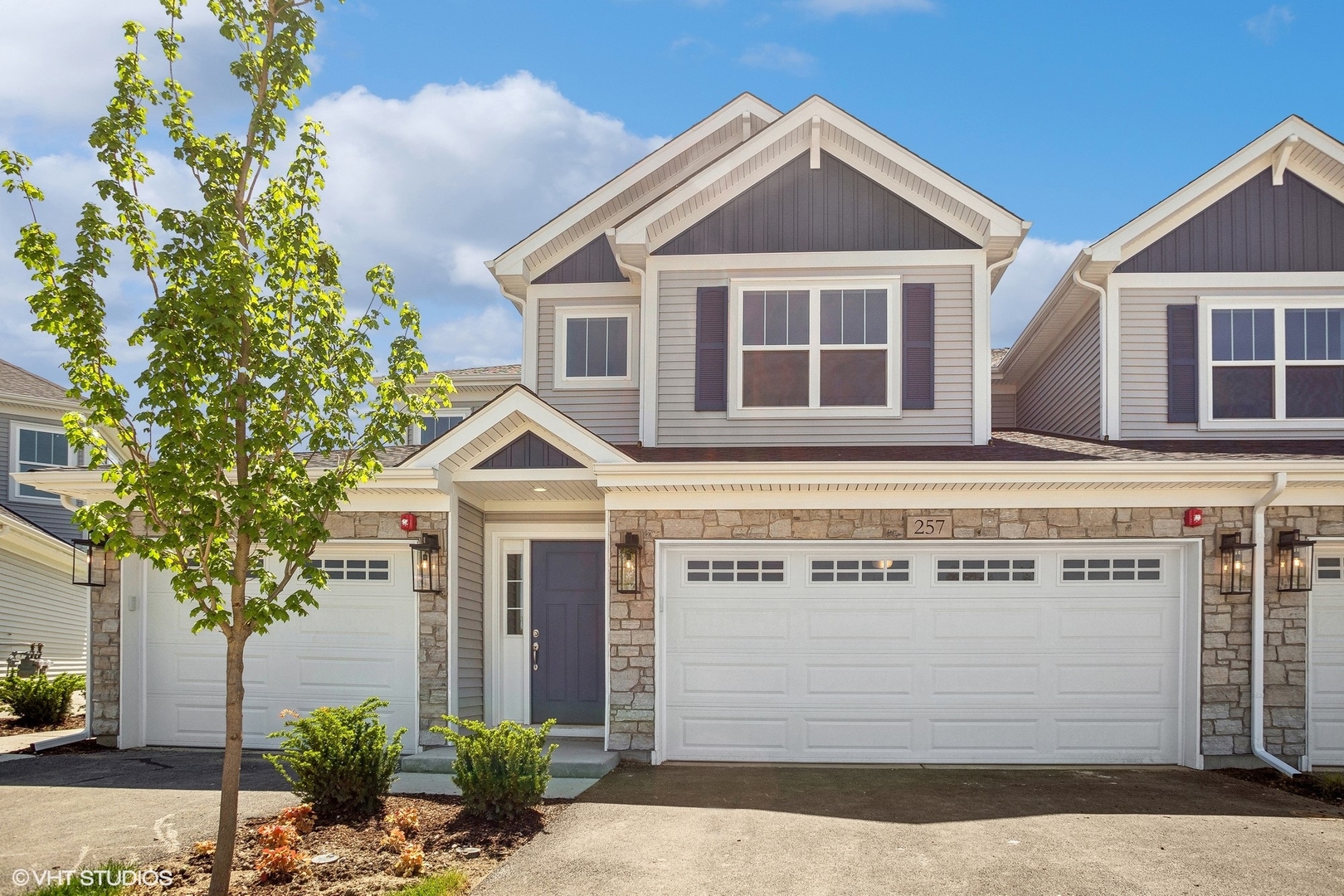 321 Masters Drive Addison, IL 60101 - Photo 1 of 3 a front view of a house with a yard
