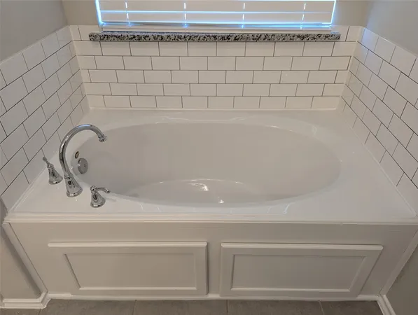 a bathroom with a bathtub