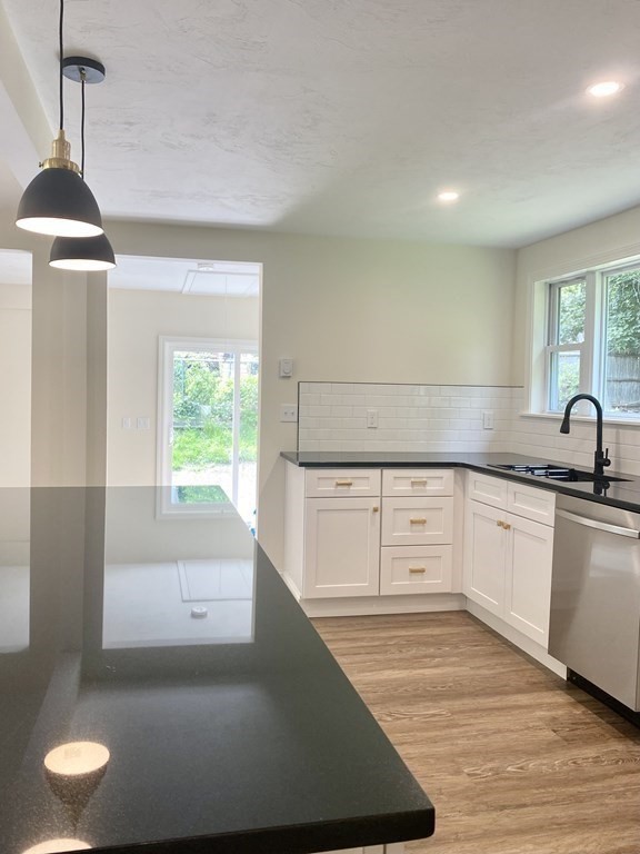 5 Wellesley Avenue Worcester, MA 01605 - Photo 15 of 31 a kitchen with a sink appliances and cabinets