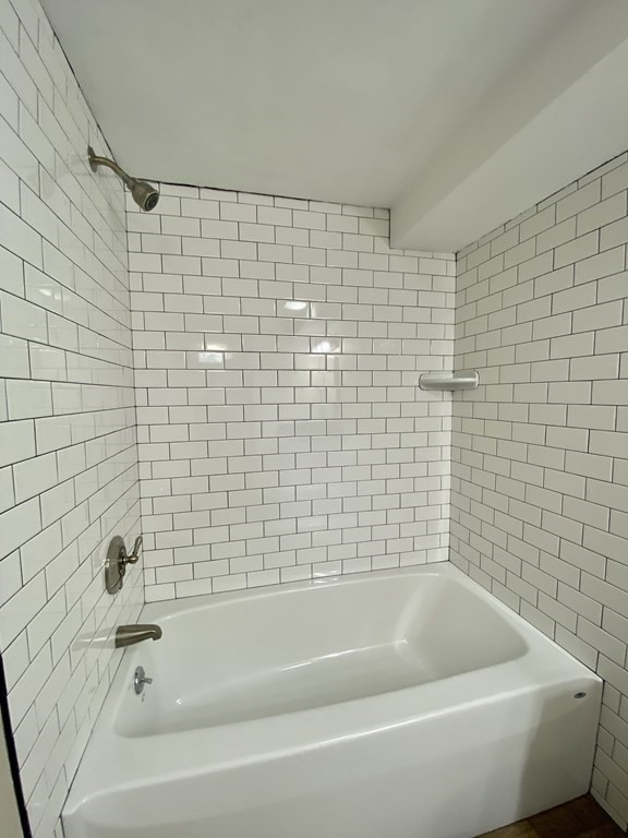 5 Wellesley Avenue Worcester, MA 01605 - Photo 29 of 31 a bathroom with a bathtub
