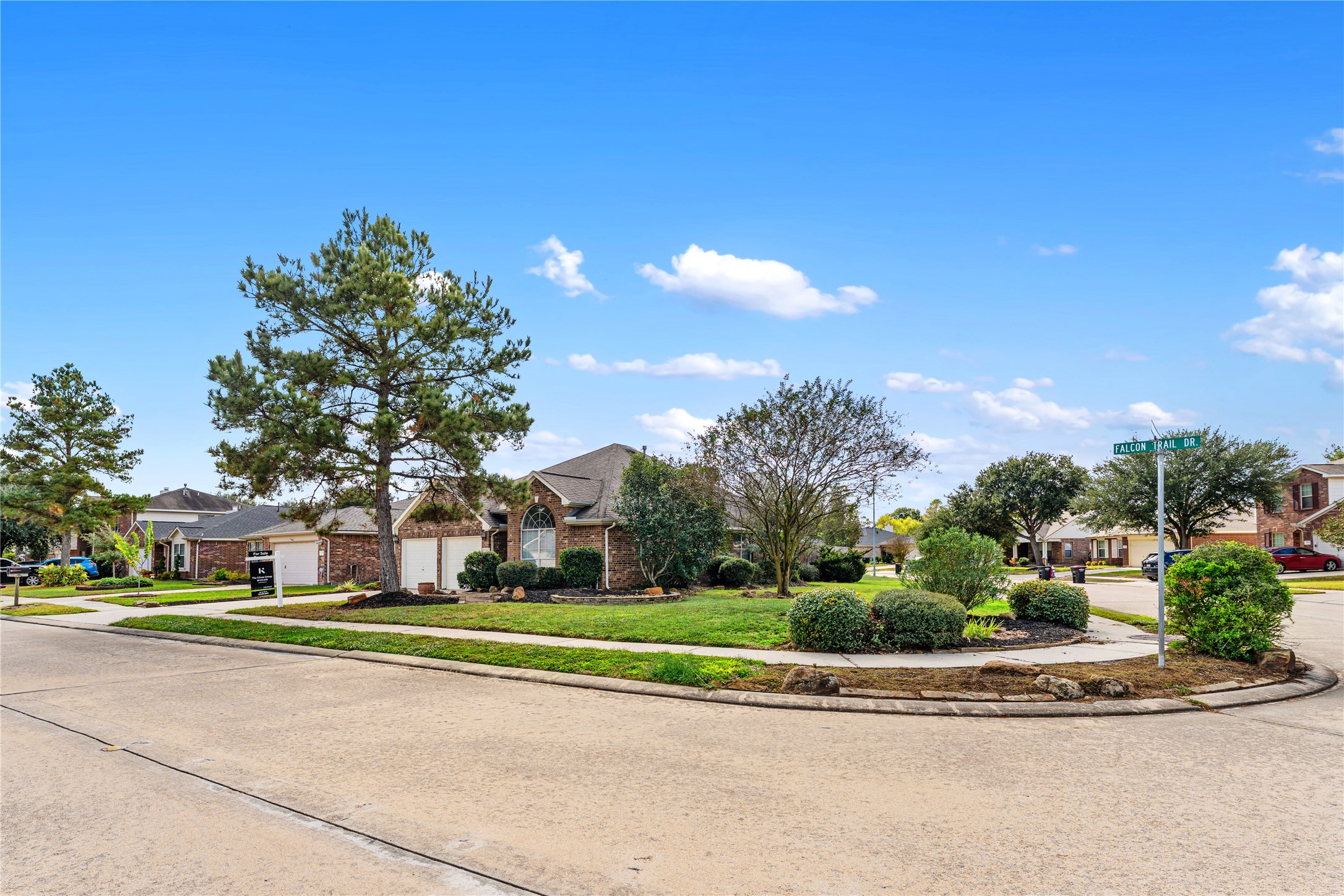 3214 Falcon Trail Drive Spring, TX 77373 - Photo 2 of 29 a view of a house with a big yard and large trees