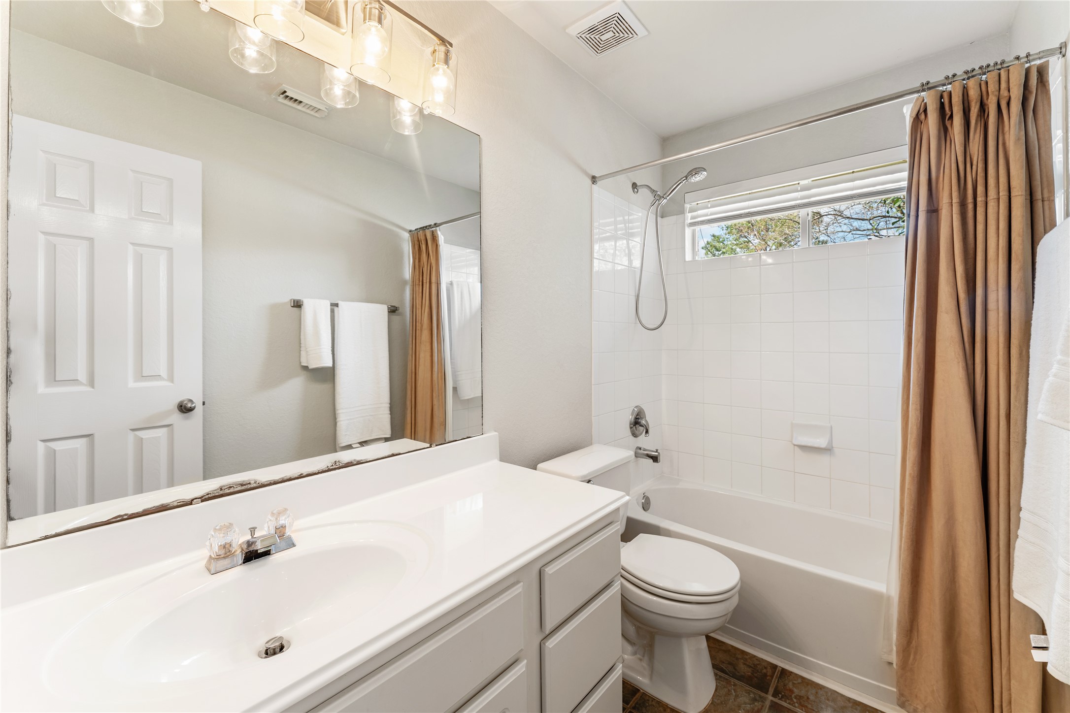 3214 Falcon Trail Drive Spring, TX 77373 - Photo 25 of 29 a bathroom with a sink a toilet and shower