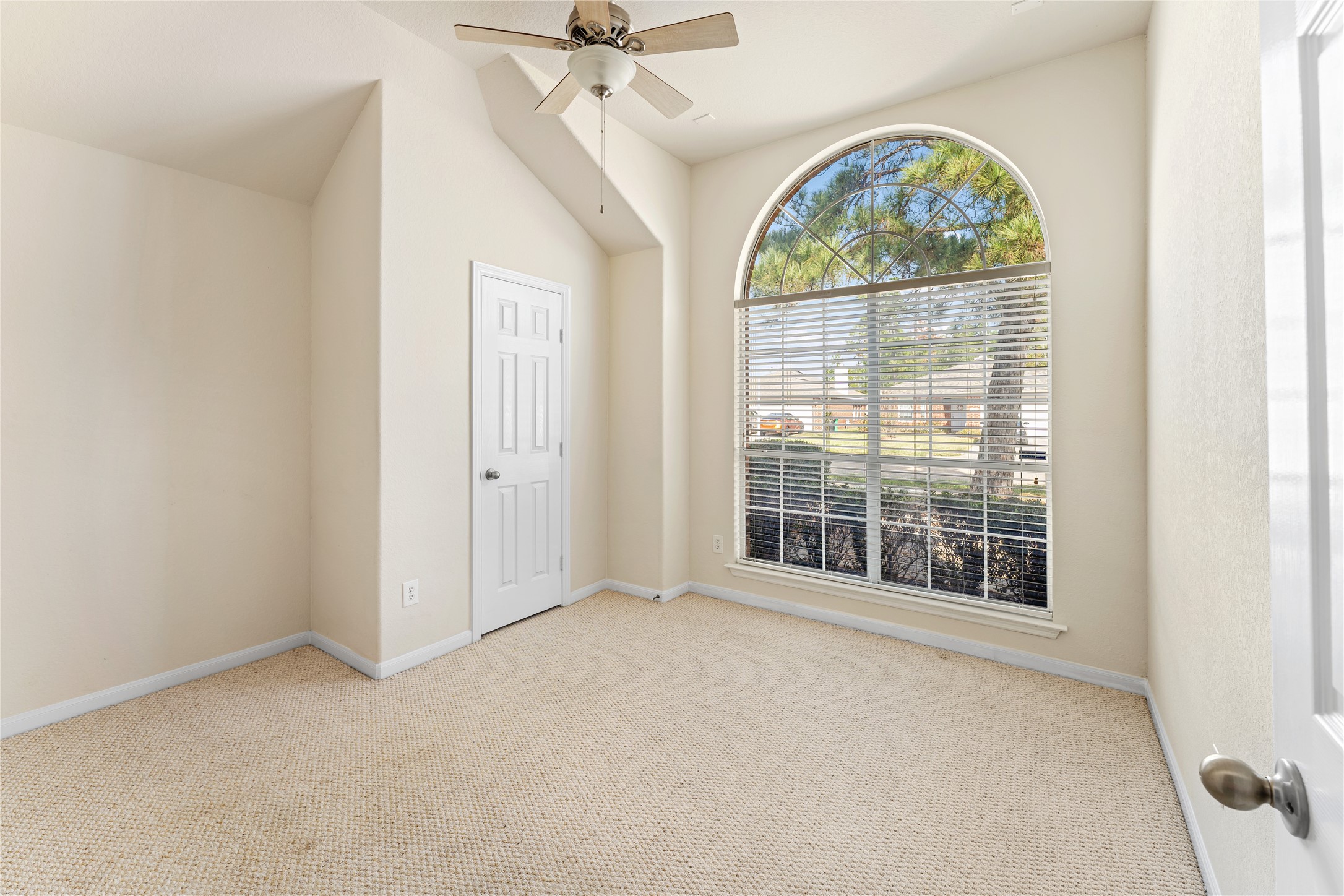 3214 Falcon Trail Drive Spring, TX 77373 - Photo 26 of 29 an empty room with windows and outdoor view