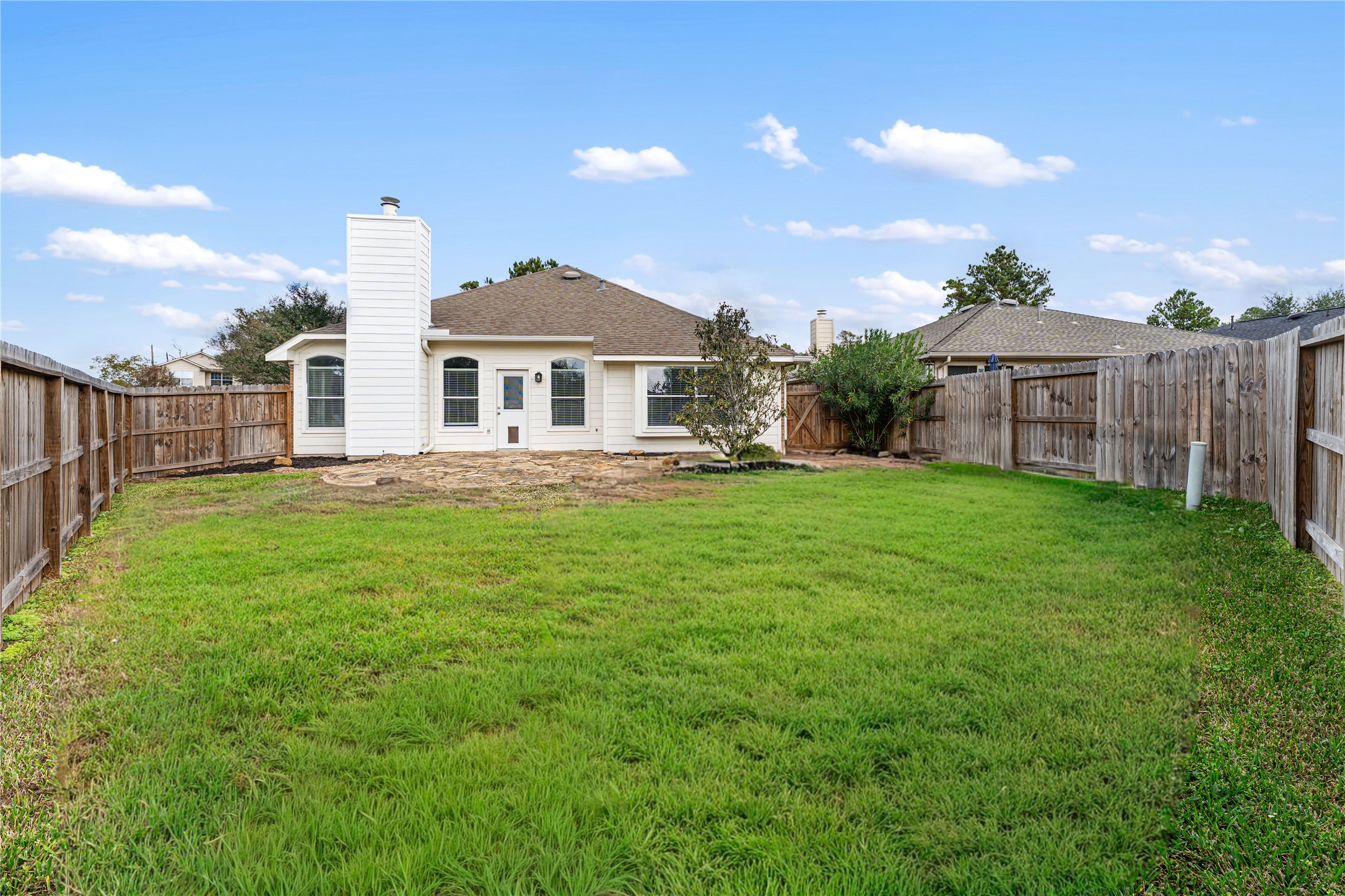 3214 Falcon Trail Drive Spring, TX 77373 - Photo 28 of 29 a front view of a house with a yard
