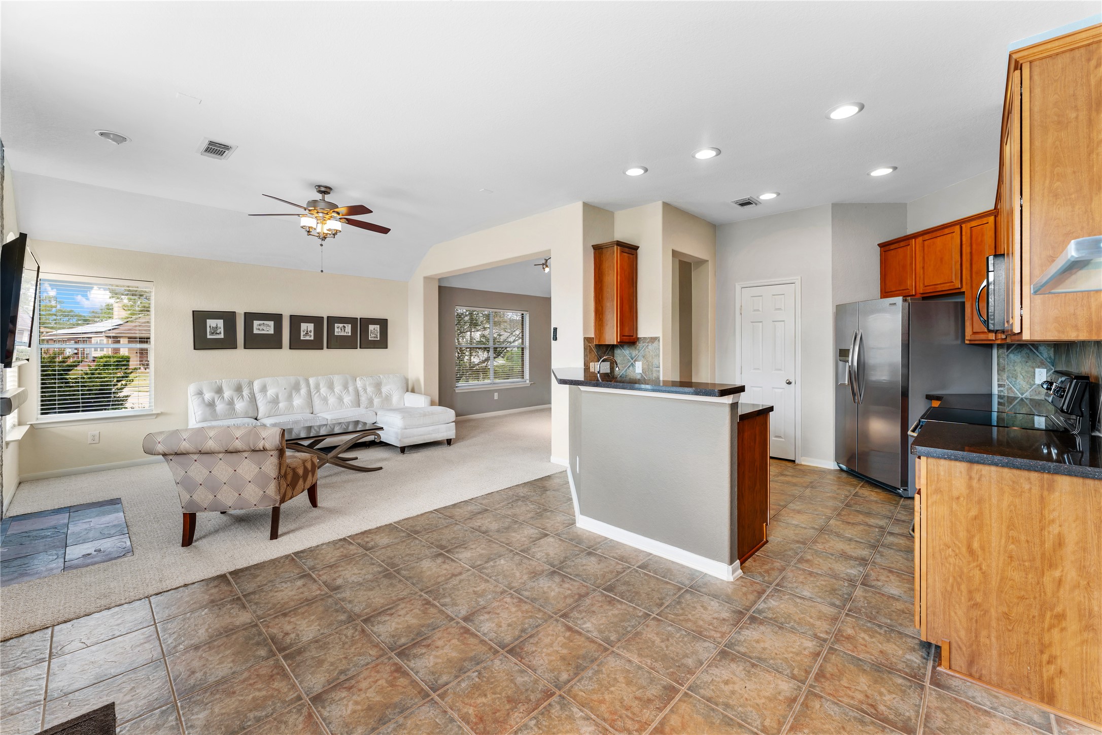 3214 Falcon Trail Drive Spring, TX 77373 - Photo 10 of 29 a living room with furniture and a kitchen