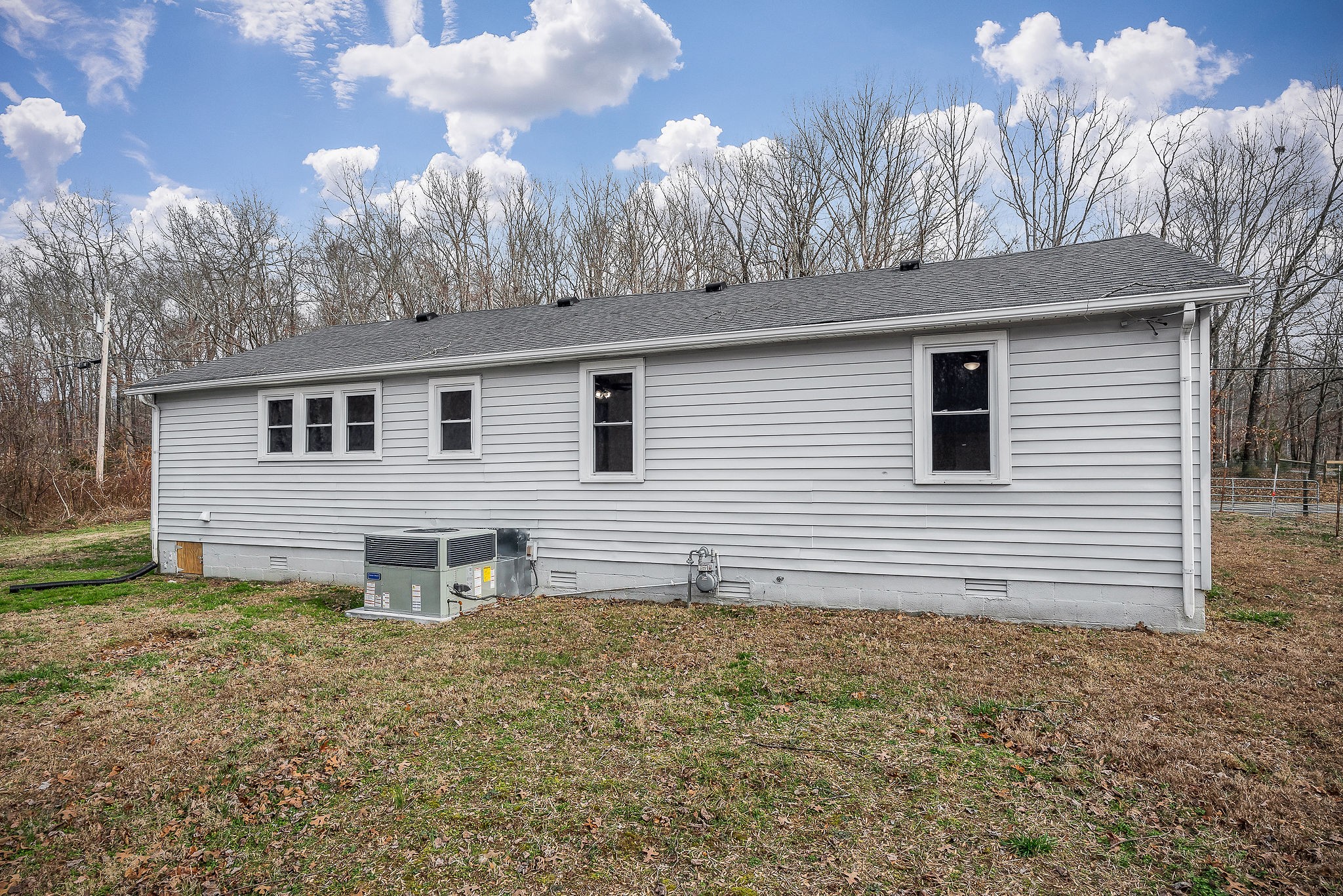 240 Blue Hill Road Woodbury, TN 37190 - Photo 15 of 17 a view of a house with a yard