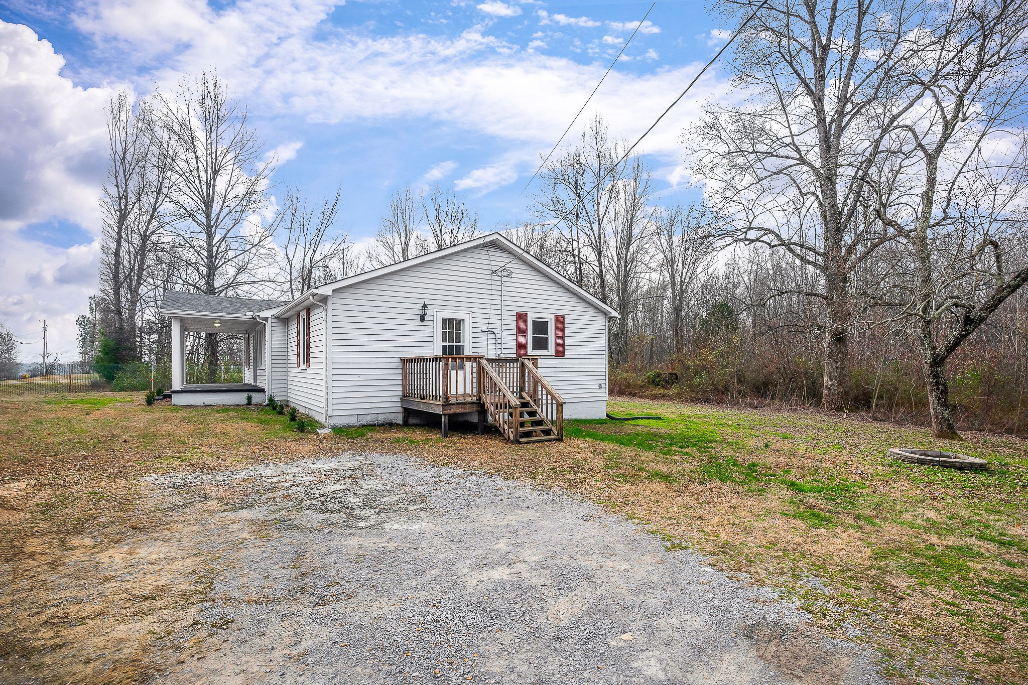 240 Blue Hill Road Woodbury, TN 37190 - Photo 17 of 17 a view of a house with backyard