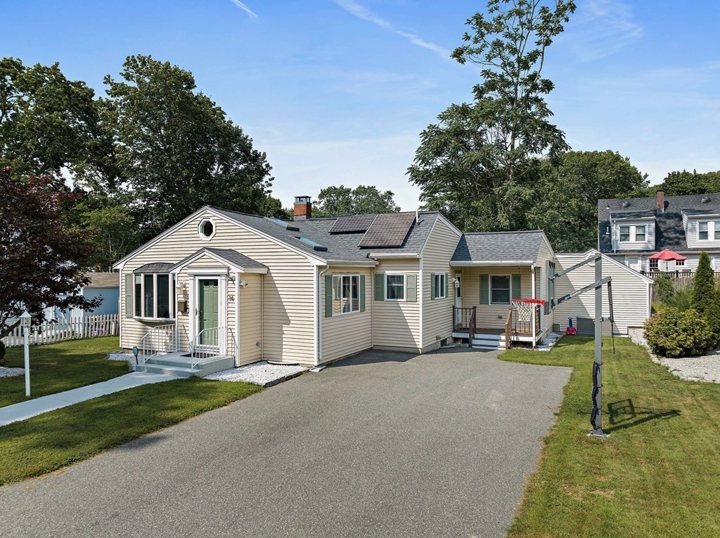 14 Edith Road Weymouth, MA 02189 - Photo 1 of 35 a front view of a house with a yard and trees