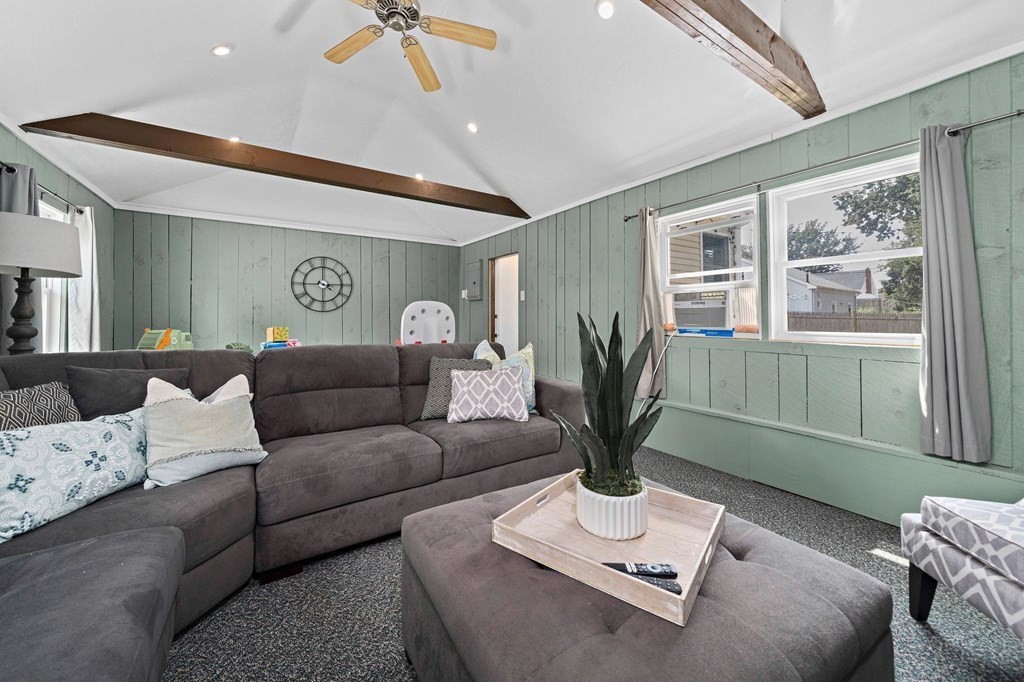 14 Edith Road Weymouth, MA 02189 - Photo 11 of 35 a living room with furniture a window and a potted plant