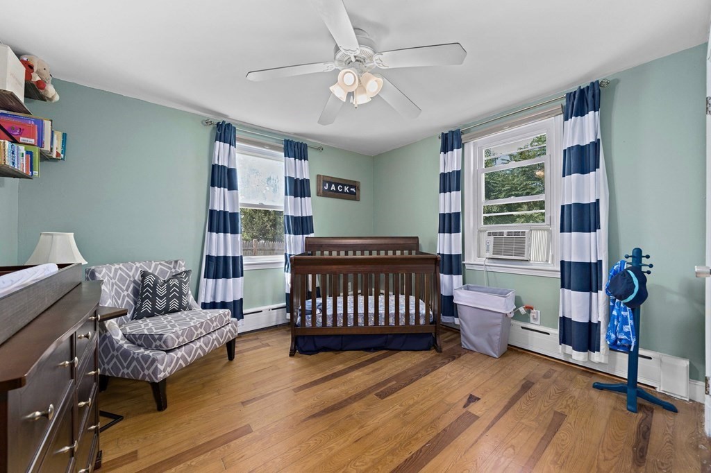 14 Edith Road Weymouth, MA 02189 - Photo 18 of 35 a bedroom with a bed and furniture