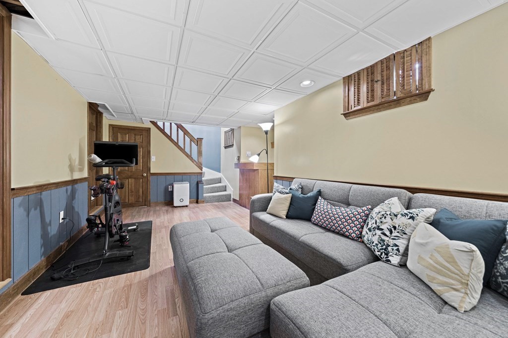 14 Edith Road Weymouth, MA 02189 - Photo 21 of 35 a living room with furniture and a flat screen tv