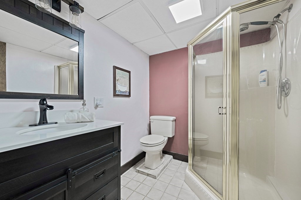 14 Edith Road Weymouth, MA 02189 - Photo 24 of 35 a bathroom with a sink and a mirror