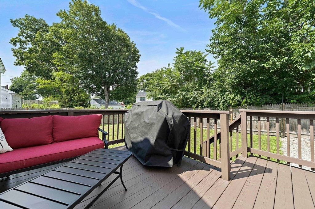 14 Edith Road Weymouth, MA 02189 - Photo 25 of 35 a view of a deck with wooden floor and outdoor seating