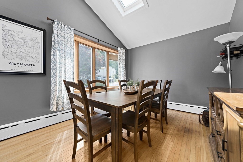 14 Edith Road Weymouth, MA 02189 - Photo 3 of 35 a view of a dining room with furniture window and wooden floor