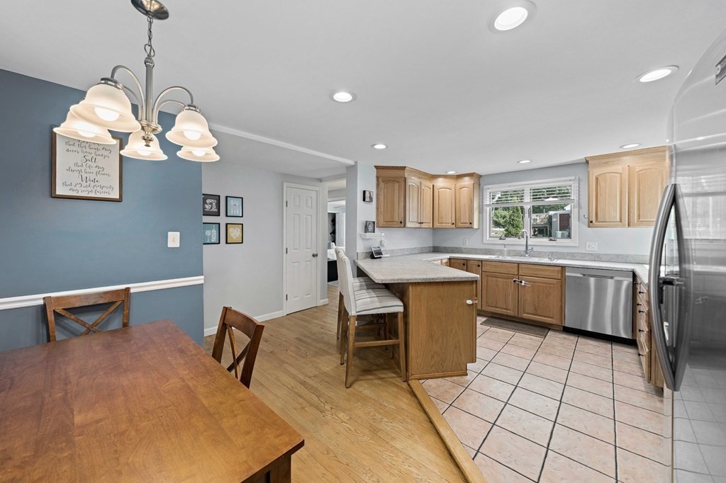 14 Edith Road Weymouth, MA 02189 - Photo 6 of 35 a kitchen with a sink a counter space cabinets and appliances