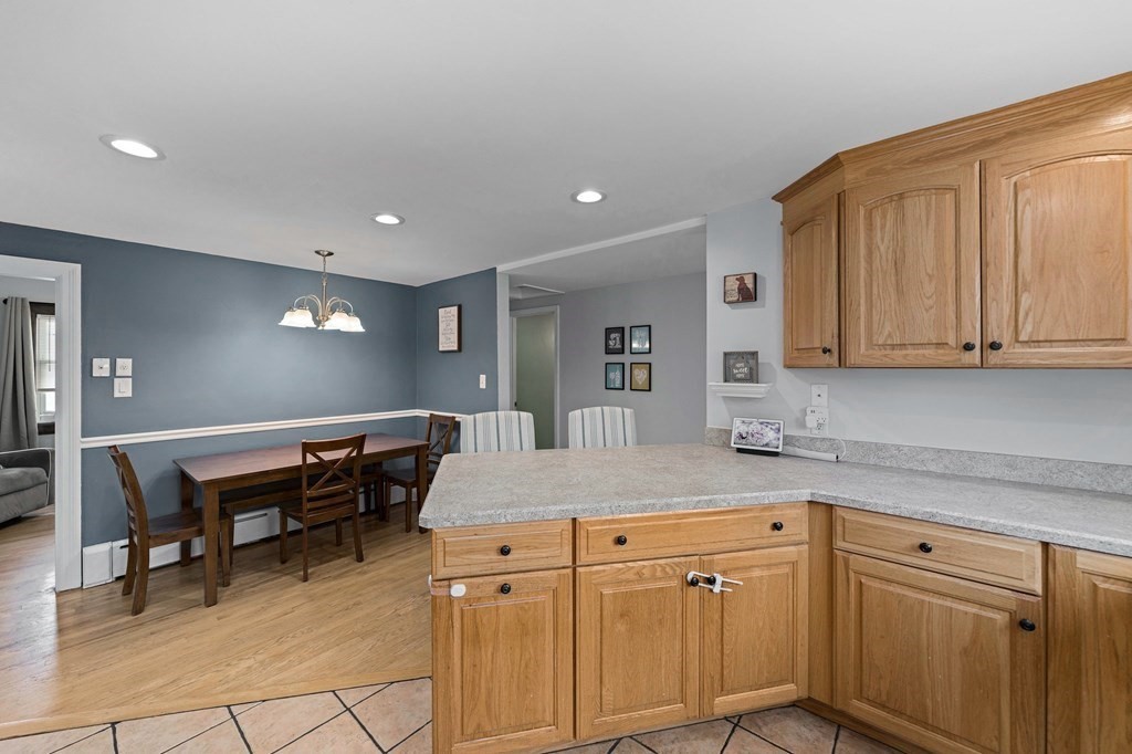 14 Edith Road Weymouth, MA 02189 - Photo 9 of 35 a kitchen with a sink and cabinets