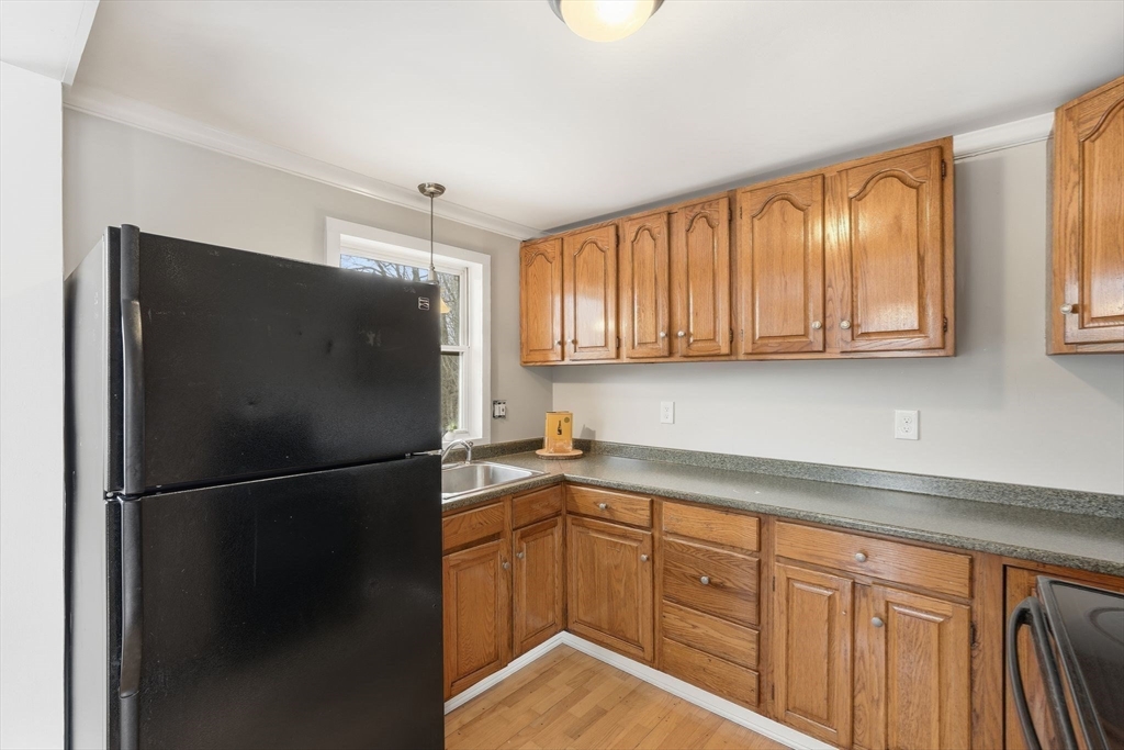 5 Marco Drive Pittsfield, MA 01201 - Photo 11 of 42 a kitchen with stainless steel appliances granite countertop a refrigerator sink and cabinets