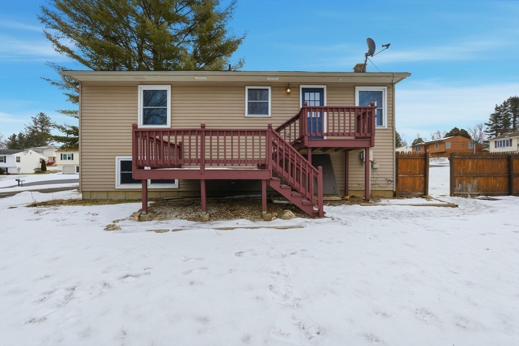 5 Marco Drive Pittsfield, MA 01201 - Photo 12 of 26 a view of a house with a wooden deck and a yard