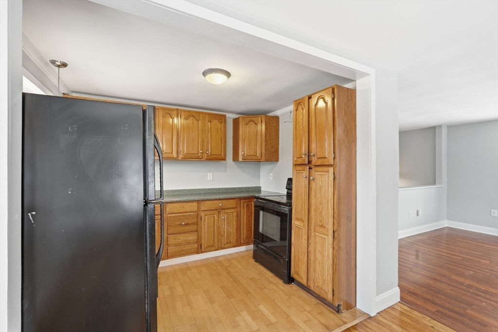 5 Marco Drive Pittsfield, MA 01201 - Photo 16 of 42 a kitchen with stainless steel appliances granite countertop a refrigerator and a sink
