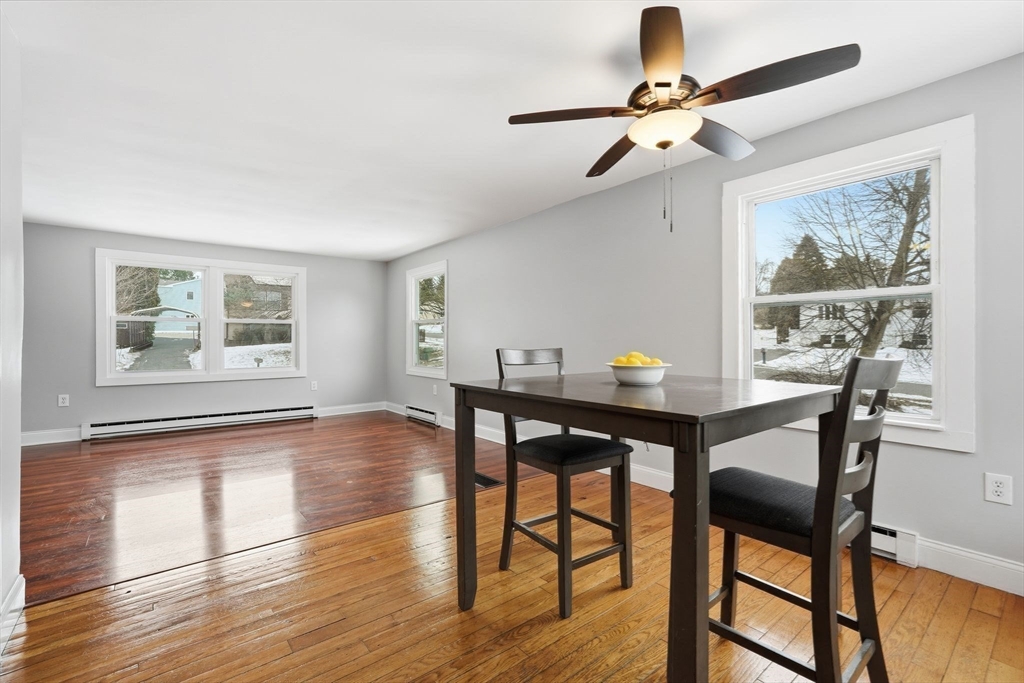 5 Marco Drive Pittsfield, MA 01201 - Photo 18 of 42 a view of a dining room with furniture window and wooden floor
