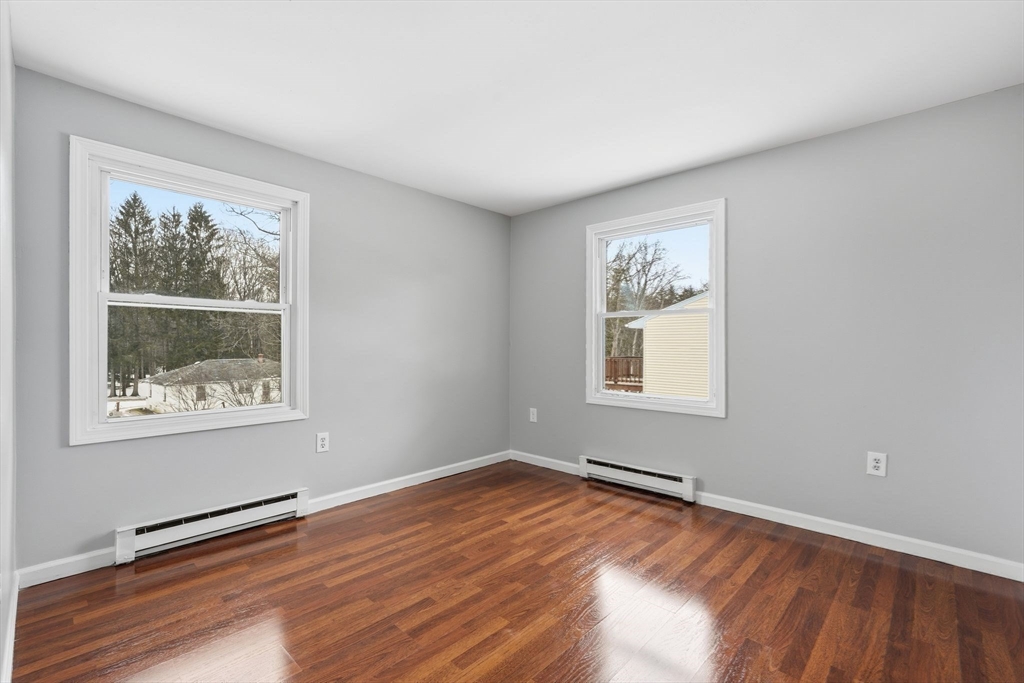 5 Marco Drive Pittsfield, MA 01201 - Photo 18 of 26 wooden floor in an empty room with a window