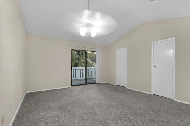 a view of a porch with a tree