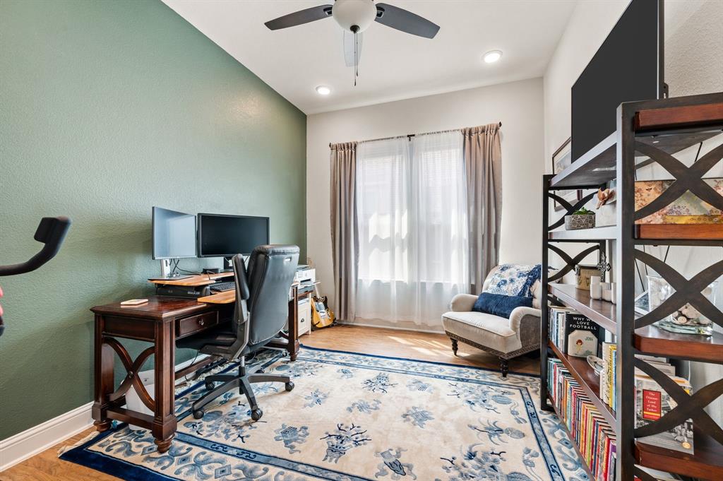 1226 Aster Place Haslet, TX 76052 - Photo 16 of 40 a view of a livingroom with workspace and a window