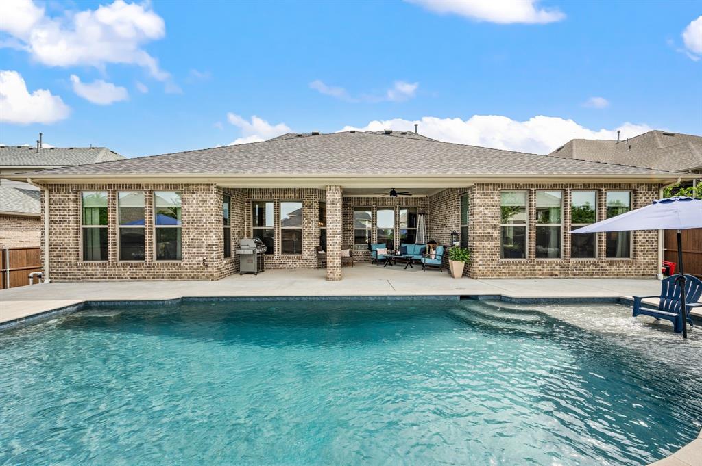 1226 Aster Place Haslet, TX 76052 - Photo 26 of 40 a view of a house with swimming pool and porch