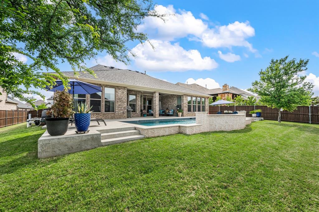 1226 Aster Place Haslet, TX 76052 - Photo 29 of 40 a view of house with a big yard potted plants and large tree