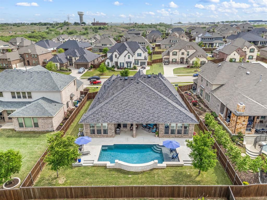 1226 Aster Place Haslet, TX 76052 - Photo 30 of 40 an aerial view of residential houses with outdoor space and parking