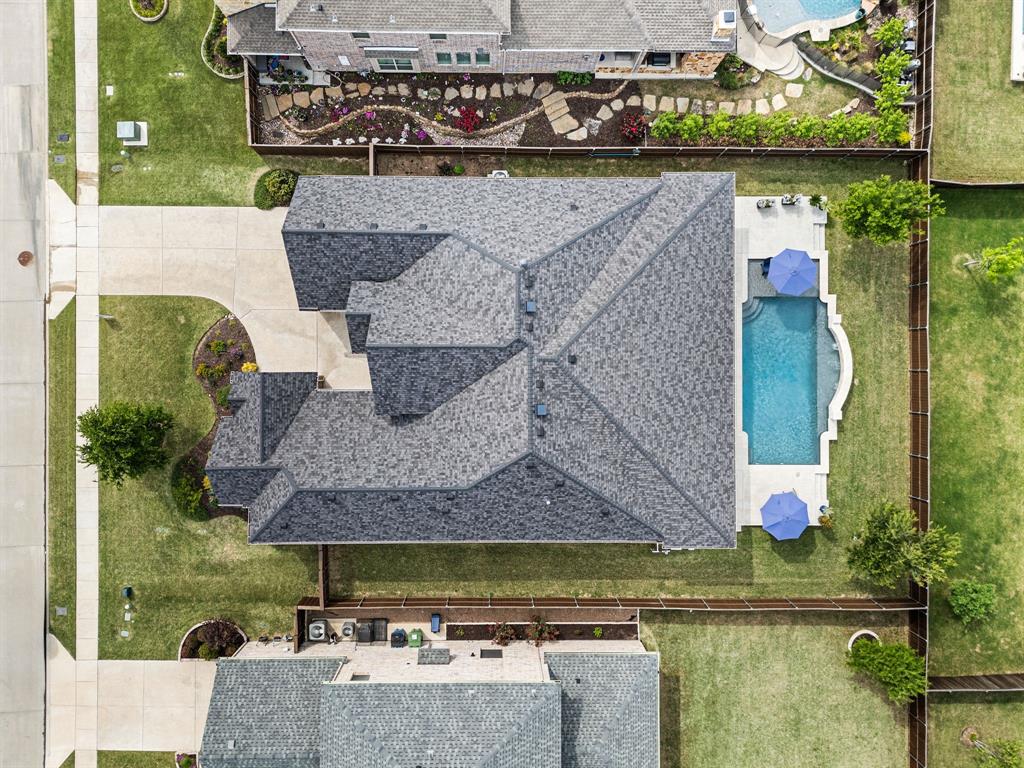 1226 Aster Place Haslet, TX 76052 - Photo 31 of 40 an aerial view of a house with a lake view