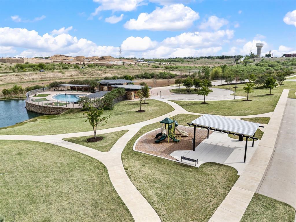 1226 Aster Place Haslet, TX 76052 - Photo 33 of 40 a view of a swimming pool with a patio