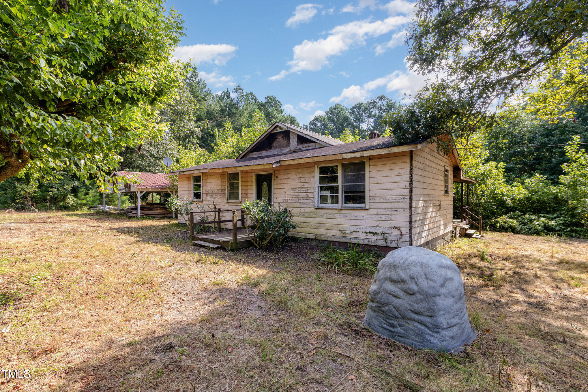 4620 Sams Road Mebane, NC 27302 - Photo 8 of 31 a view of a house with a yard