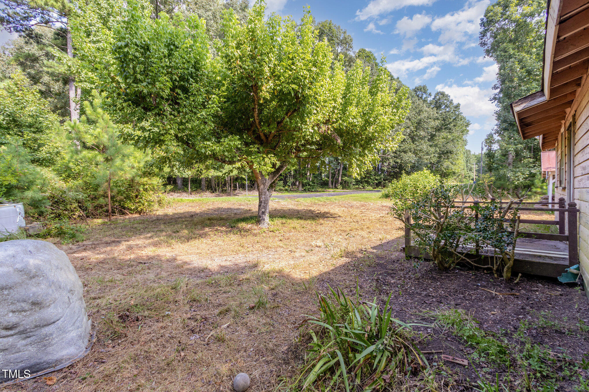4620 Sams Road Mebane, NC 27302 - Photo 9 of 31 a view of a backyard with sitting area