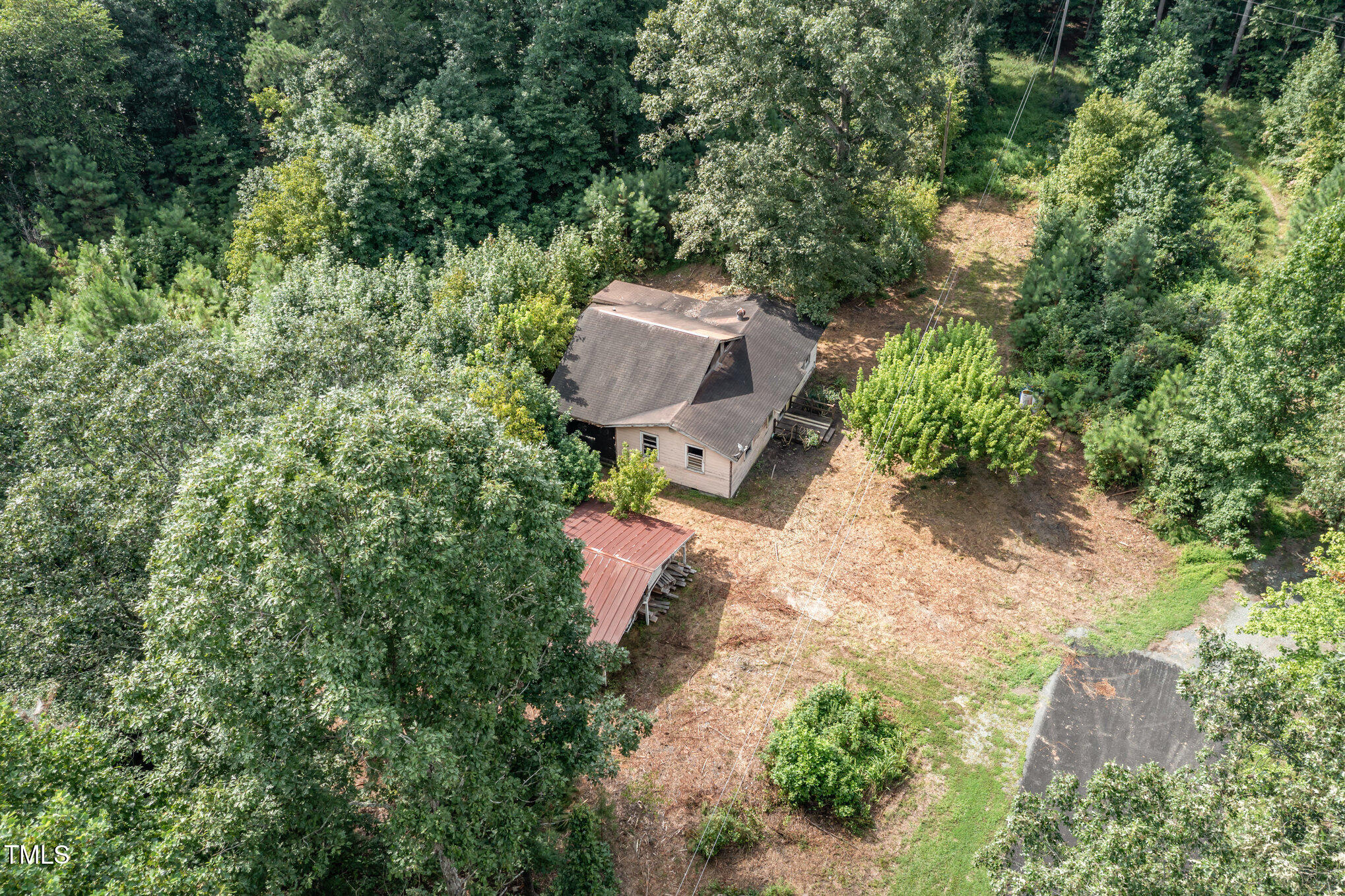 4620 Sams Road Mebane, NC 27302 - Photo 17 of 31 an aerial view of a house with a yard and outdoor seating