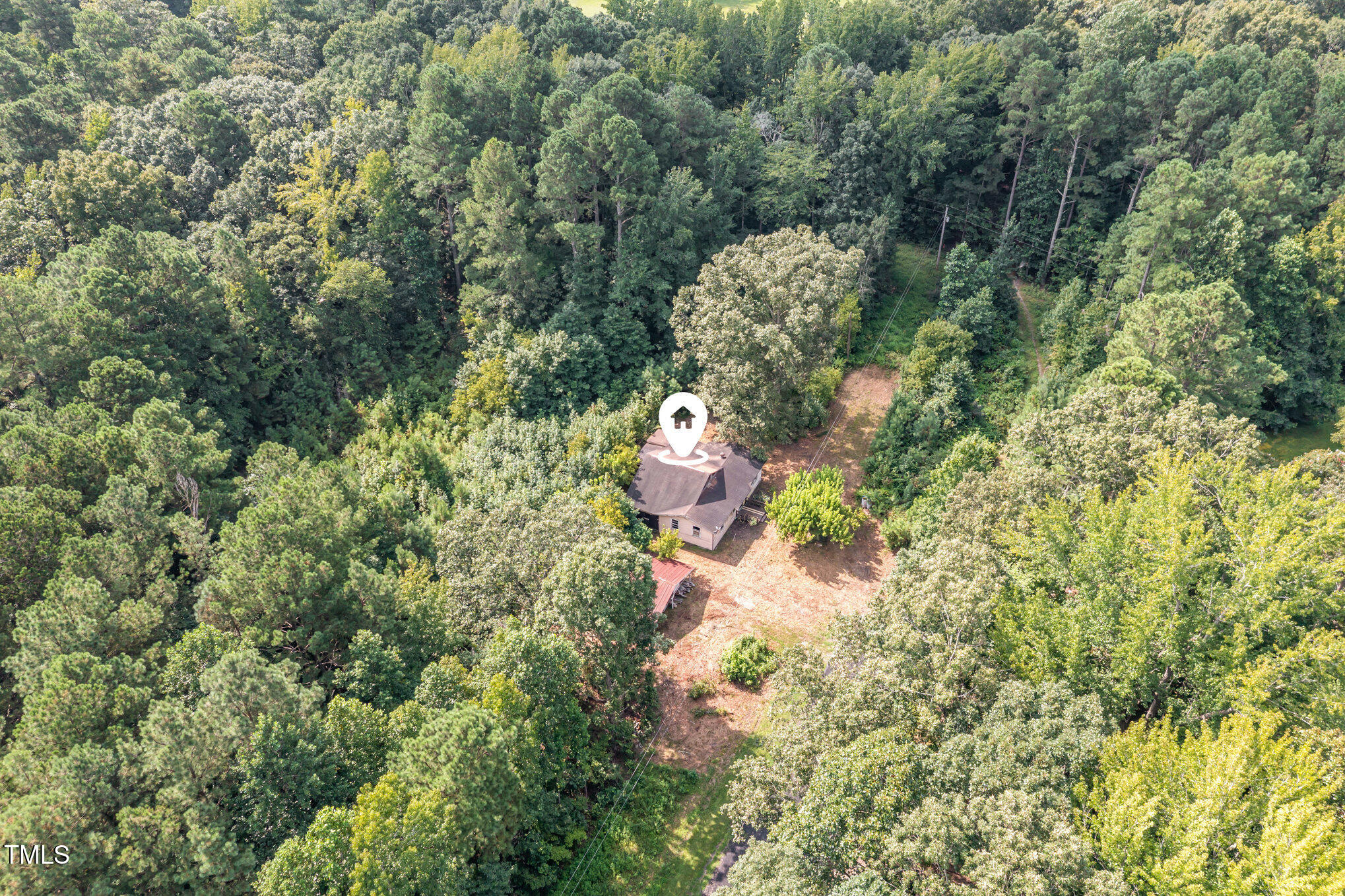4620 Sams Road Mebane, NC 27302 - Photo 18 of 31 a bathroom with a sink and mirror