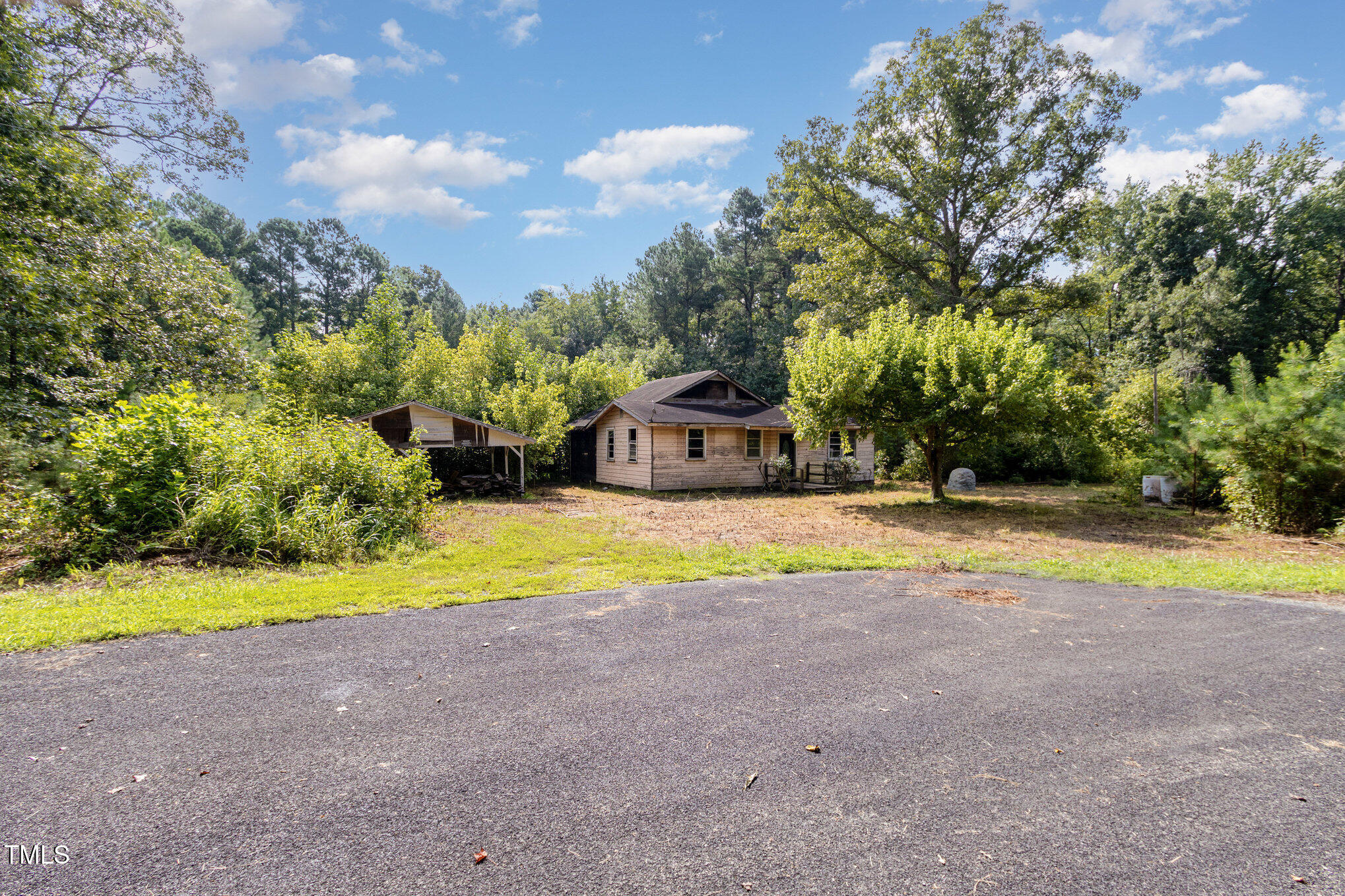 4620 Sams Road Mebane, NC 27302 - Photo 2 of 31 a view of swimming pool with large trees and large trees