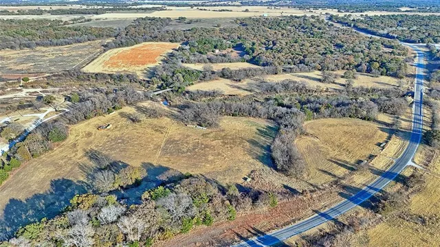 a view of swimming pool with a yard