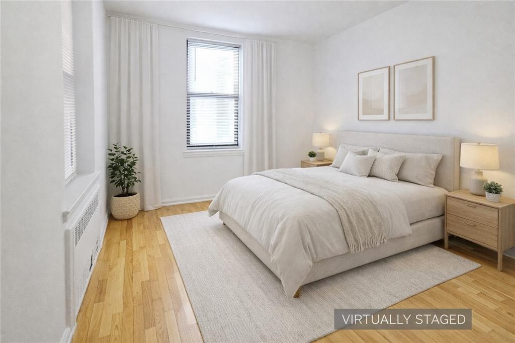 302 96th Street, Unit 3W Brooklyn, NY 11209 - Photo 4 of 12 a spacious bedroom with a bed and a window
