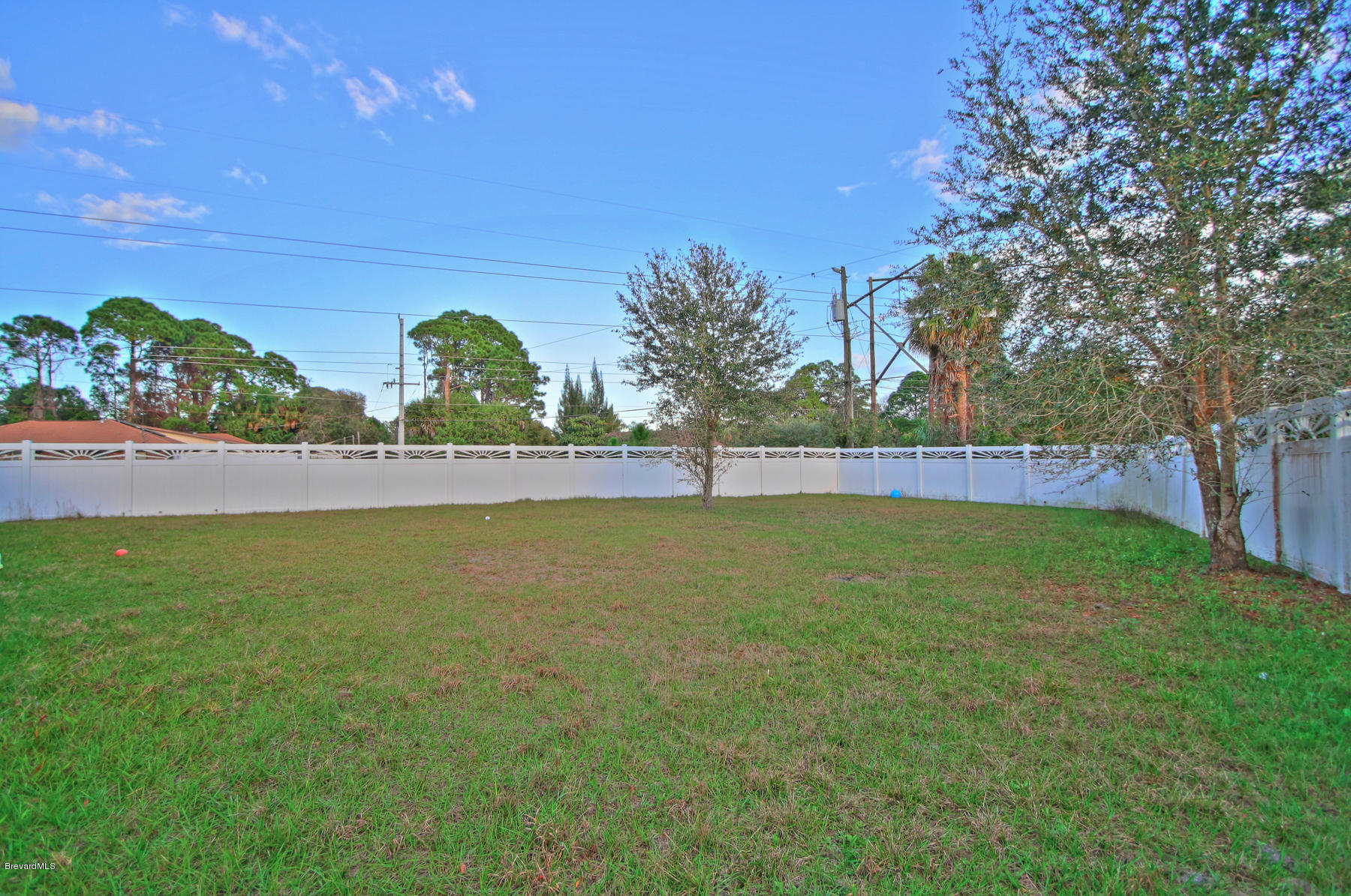 244 Abello Road Southeast Palm Bay, FL 32909 - Photo 23 of 23 a view of outdoor space with garden