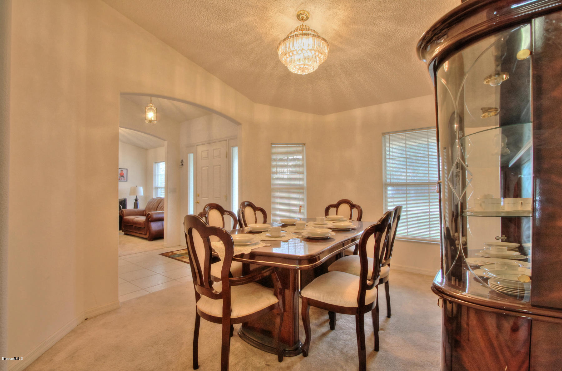 244 Abello Road Southeast Palm Bay, FL 32909 - Photo 8 of 23 a dining room with furniture and window