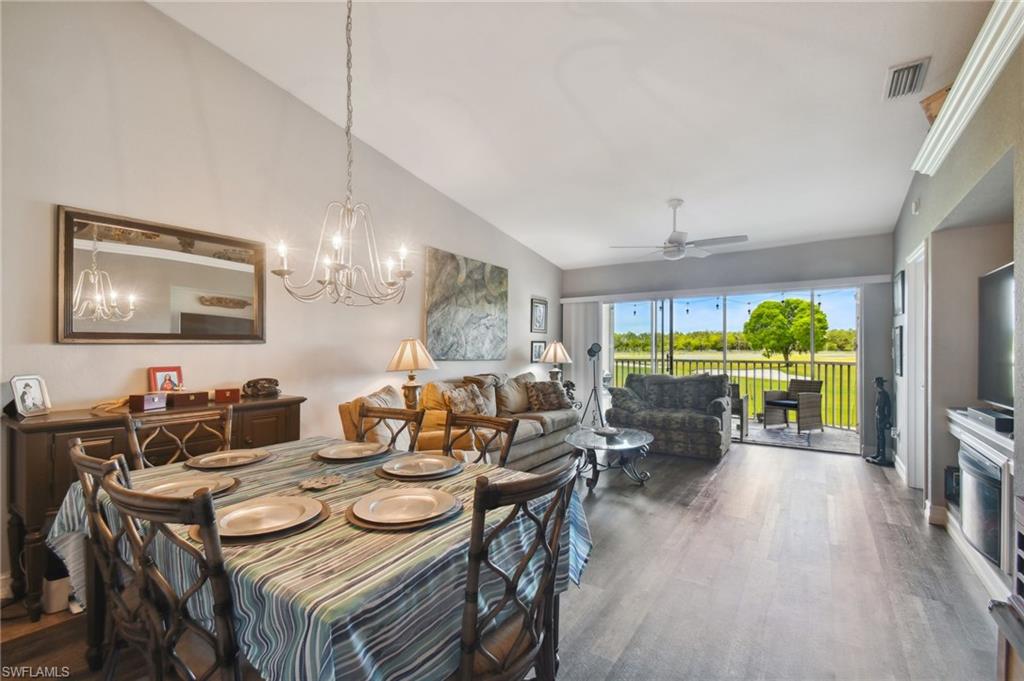 9165 Michael Circle, Unit 1002 Naples, FL 34113 - Photo 11 of 39 a view of a dining room with furniture window and outside view