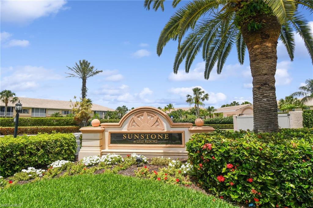 9165 Michael Circle, Unit 1002 Naples, FL 34113 - Photo 36 of 39 a view of a park that has a sign on it