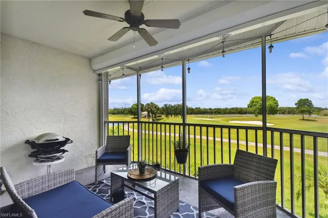 a view of a park with swings and slides