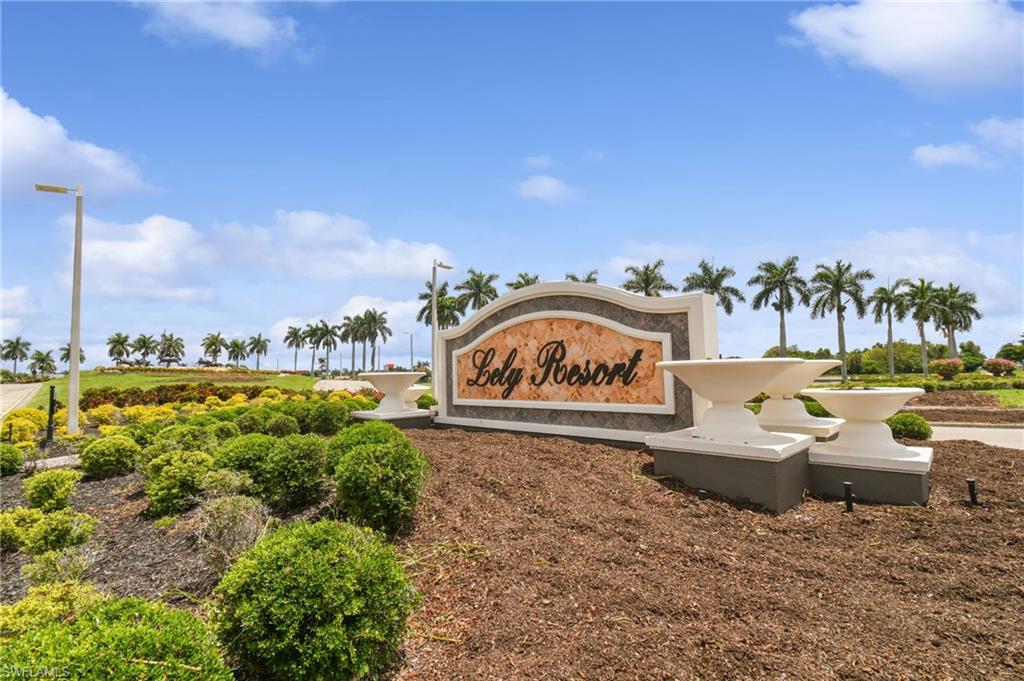 9165 Michael Circle, Unit 1002 Naples, FL 34113 - Photo 39 of 39 a view of a park with swings and slides