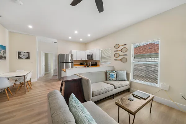 a living room with furniture and a window